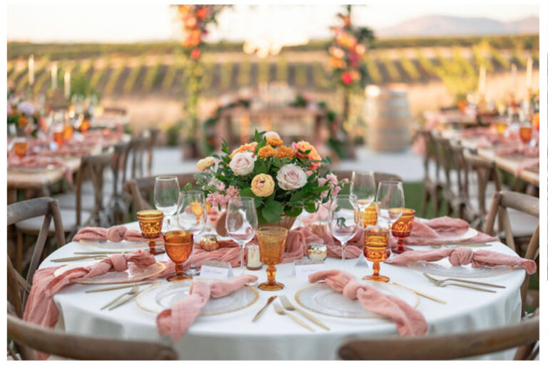 flowers on a beautiful tablescape with orange and pink hues